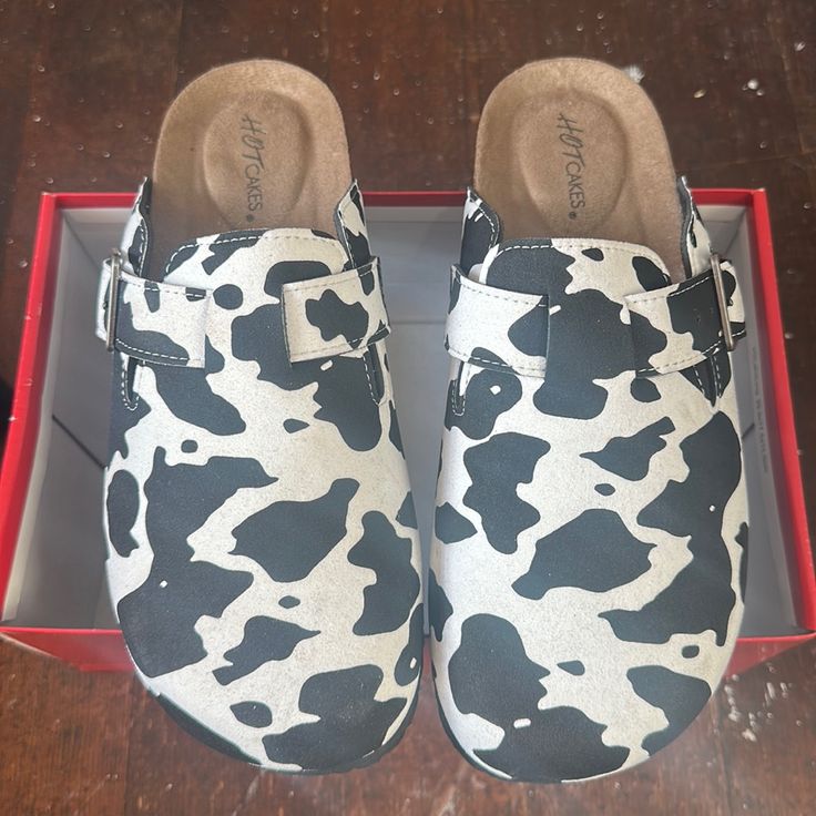 Brand New Hot Cakes Brand Cow Print Slip On Clogs White Casual Platform Mules, Casual White Platform Mules, Casual Medium Width Clogs With Round Toe, Casual Medium Width Round Toe Clogs, Casual White Mules With Round Toe, Casual White Round Toe Mules, Casual Clogs With Medium Width And Flat Heel, White Round Toe Mules Medium Width, White Round Toe Medium Width Mules