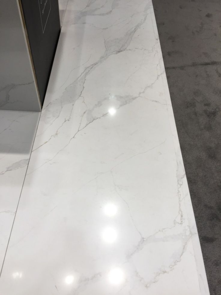 the counter top is white and has some lights on it