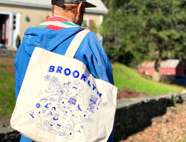 Oversized tote bag to carry whatever you need to your destination. This large bag, featuring Brooklyn, New York, is great to have on hand for impromptu trips to the beach and weekend adventures. • Our largest tote bag is big enough for all your adventures: big and small. • Ideal gift bag for weddings, corporate events, and party favors. • 100% natural cotton (10 oz canvas). • Approximately 19″ x 15″ with a 5 gusset and 23 handles and inside pocket. • Made in Brooklyn, NY, USA. Casual Canvas Tote Bag For Outdoor Activities, Large Capacity Hobo Canvas Travel Bag, Large Capacity Hobo Canvas Bag For Travel, Casual Tote Travel Bag For Trip, Casual Hobo Beach Bag For Travel, Casual Tote Bag For Trip, Casual Beach Bag For Weekend Trips, Casual Tote Travel Bag For Weekend Trips, Casual Tote Beach Bag For Weekend Trips