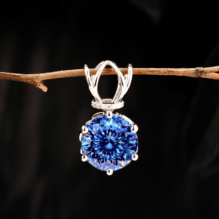 Portuguese Cut moissanite Diamond Pendant , 10K/14K/18K/ Solid Gold Portuguese Cut Moissanite Pendant For Women Gift, Cyan Blue Portuguese  ✥ 𝐌𝐚𝐢𝐧 𝐒𝐭𝐨𝐧𝐞 𝐃𝐞𝐭𝐚𝐢𝐥𝐬 ↣ Shape And Cut :- Round Portuguese Cut ↣ Type: Moissanite Diamond  ↣ Weight: 5.50  CT ↣ Dimension:  11.00 MM  (App.) ↣ Color: Sapphire Blue  ↣ Clarity: VVS ↣ Making Process: Handmade - Crafted Thank You Round Cut Tanzanite Diamond Jewelry, Round Cut Diamond Treated Tanzanite Jewelry, Round Tanzanite Necklace With Prong Setting, Blue Moissanite Jewelry With Diamond Accents, Sapphire Tanzanite Jewelry With Prong Setting, Blue Tanzanite Jewelry With Prong Setting, Diamond White Tanzanite Round Jewelry, Diamond White Jewelry With Round Tanzanite, Sapphire Moissanite Jewelry For Anniversary