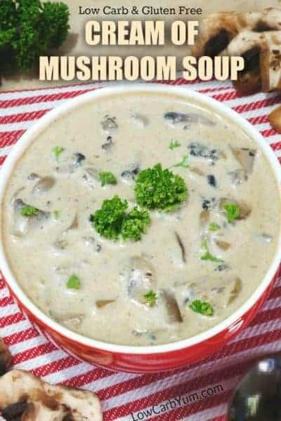 a bowl of cream of mushroom soup with mushrooms and parsley in the foreground