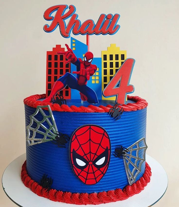 a spiderman birthday cake with the number four on top