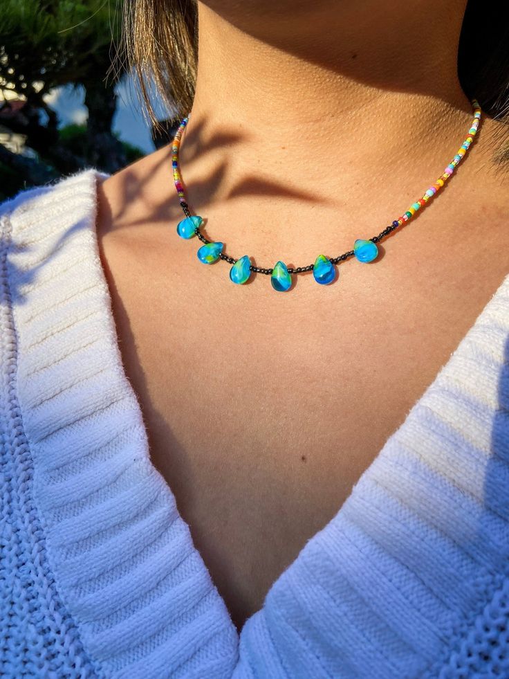 Raindrops Necklace - Etsy Multicolor Beaded Teardrop Necklace, Handmade Bohemian Iridescent Beaded Necklaces, Handmade Bohemian Beaded Iridescent Necklace, Handmade Bohemian Beaded Necklaces In Iridescent Color, Teardrop Beaded Necklaces For Festivals, Teardrop Beaded Jewelry For Festivals, Multicolor Teardrop Beaded Chain Jewelry, Multicolor Adjustable Teardrop Beaded Necklace, Multicolor Adjustable Teardrop Beaded Necklaces