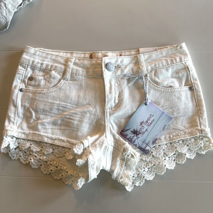 Here Shorts Have Never Been Worn And Are New With Tags! Cotton Bottoms With Lace Trim For Day Out, Cute Lace Trim Bottoms For Spring, Trendy Stretch Bottoms With Lace Trim, Fitted Casual Shorts With Lace Trim, Trendy Bottoms With Lace Trim, Casual Bottoms With Lace Trim For Spring, Casual Lace Trim Bottoms For Spring, Casual Bottoms With Lace Trim, Fitted Vacation Bottoms With Lace Trim