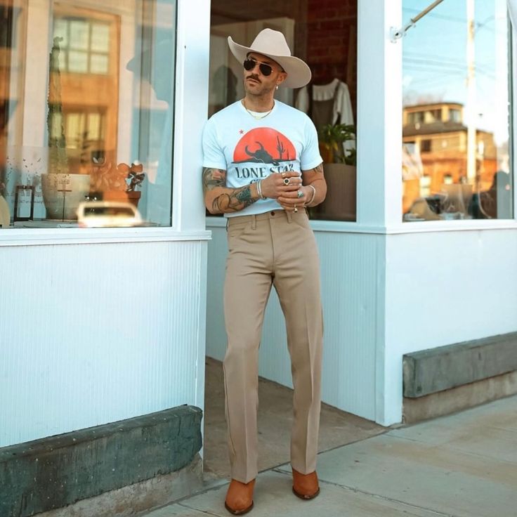 not sure what to wear? @bluecollarprep shows us that a cowboy hat is always a good idea. Man Wearing Cowboy Hat, White Cowboy Hat Outfit Men, Mens Cowboy Hat Outfit, Cowboy Hat Outfit Men, Cowboy Hat Outfit, Cowboy Hat Men, Band Shoot, Hat Outfit Men, Country Mens Fashion