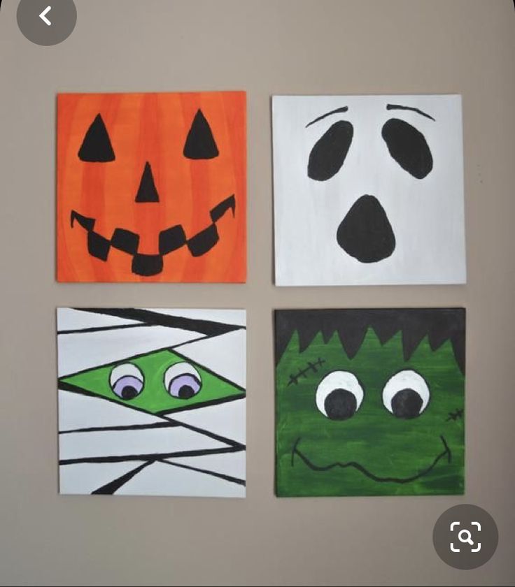 four square paintings with faces painted on them in different colors and shapes, each decorated as a halloween jack - o - lantern