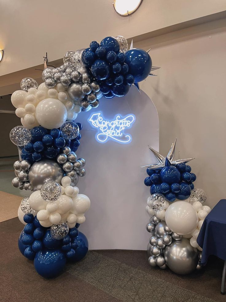 Yale Graduation Arch Backdrop with Balloon Garland by Capri & Eros Occasions Houston Star Balloon Arch, Arch Balloon Backdrop, Airplane Birthday Party Decorations, Balloon Tower, Airplane Birthday Party, Grad Party Decorations, 14th Birthday, White Balloons, Balloon Backdrop