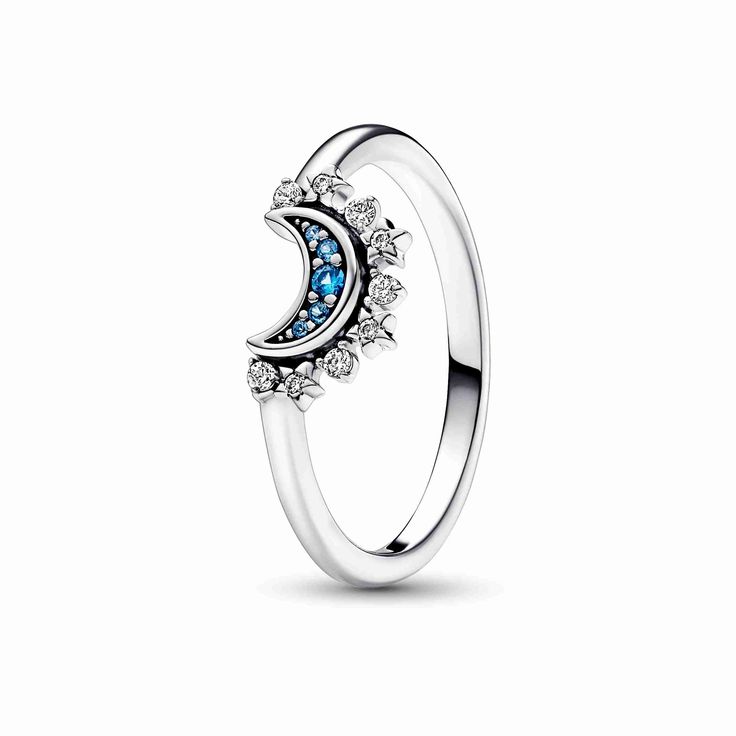 Channel lunar energy with the Celestial Blue Sparkling Moon Ring. This hand-finished ring is crafted from luminous sterling silver, with a crescent moon motif in the centre filled with deep blue pavé. Sparkling stars surround the outer side of the crescent. Wear it by itself as a symbol of enlightenment, hope and the divine feminine, or stack it with its counterpart, the Celestial Sparkling Sun Ring. The two rings fit perfectly together, representing duality and harmony in nature and within ours Pandora Celestial, Lunar Energy, I Love You Ring, Sun And Moon Rings, Sun Ring, Celestial Blue, Charms Pandora, Sparkling Stars, Pandora Rings