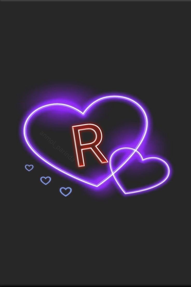 two neon hearts with the letter r in it's center and one heart is lit up