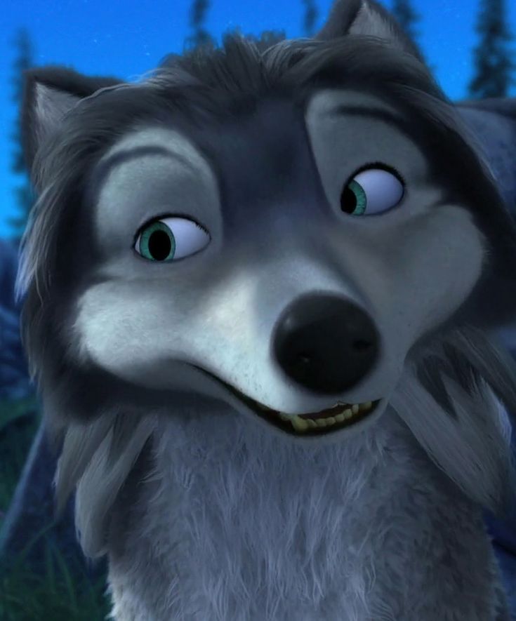 an animated wolf with big blue eyes looks at the camera while standing in front of some trees