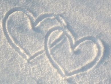 two hearts are drawn in the snow