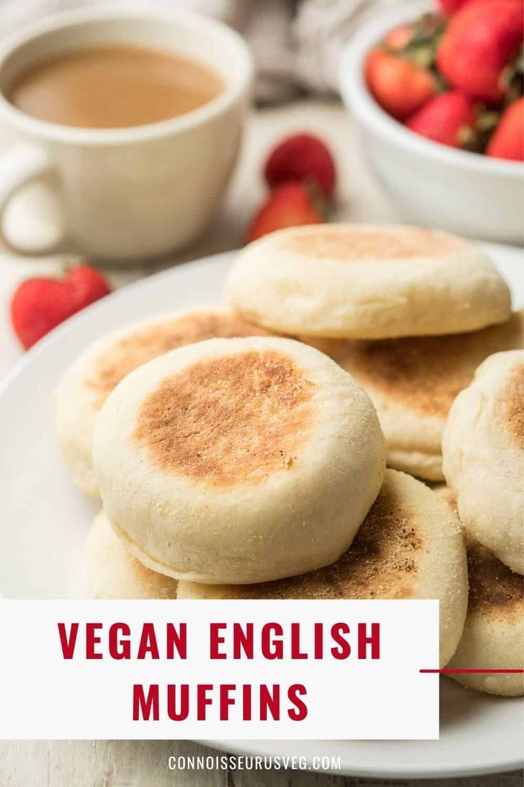 vegan english muffins on a plate with strawberries and coffee in the background