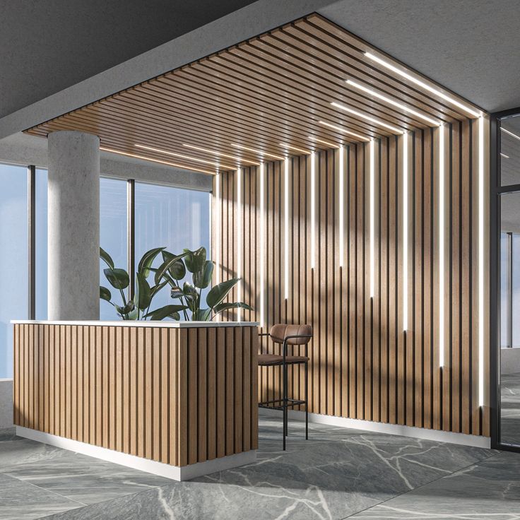 an office with wooden slatted walls and a plant in the corner by the counter