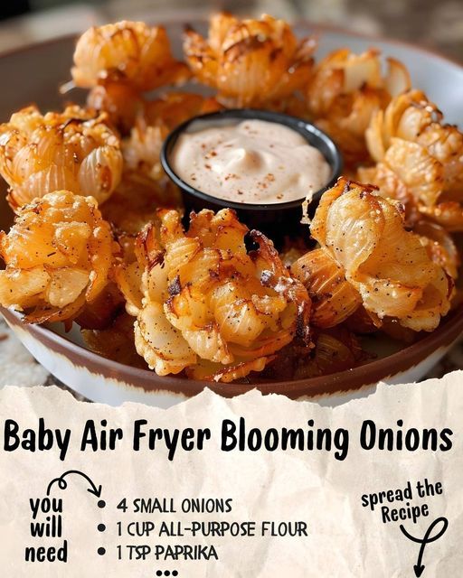 baby air fryer blooming onions on a plate with ranch dip in the middle