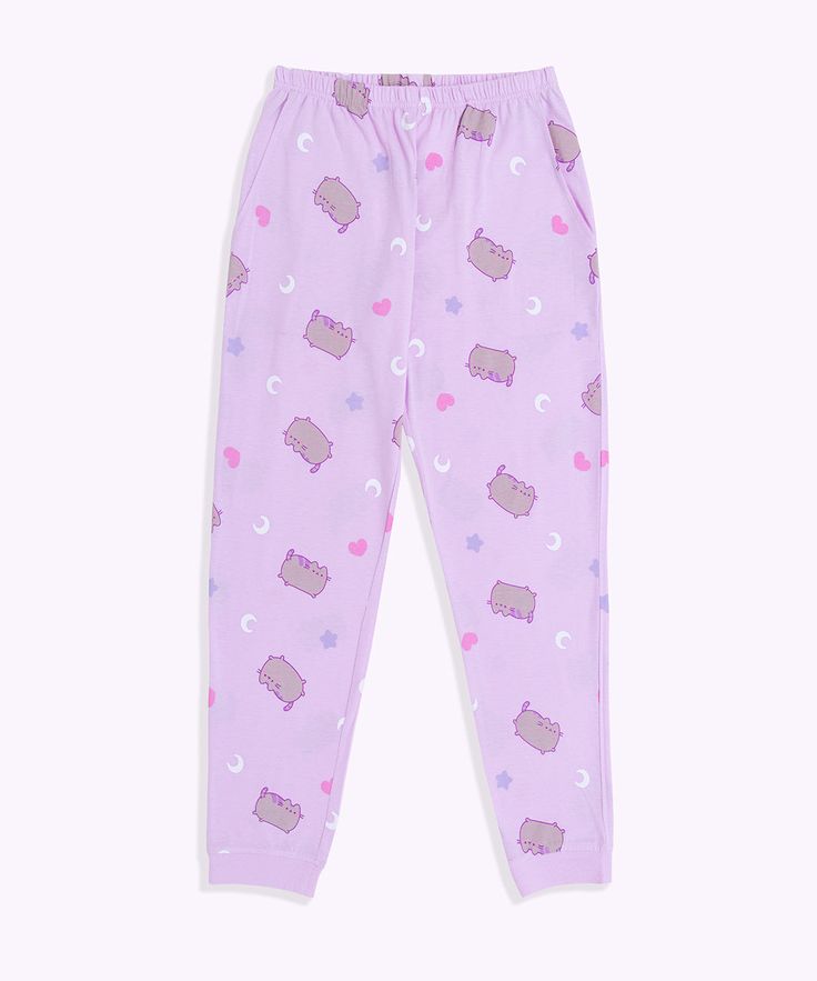 Click to see size chart How dreamy! This lavender Shop Exclusive two-piece pajama set includes a short-sleeve top and lounge pants. The super soft fabric & relaxed fit top is ideal for lounging or sleeping! Ladies fit and sizing. Relaxed-fit pajama tee & pants feature an all-over pattern of Pusheen surrounded by pastel-colored moons and stars. Pajama pants include side pockets and a tapered ankle cuff. Content: 100% Cotton. Imported. Care: Machine wash cold. Only non-chlorine bleach. Tumble dry Comfy Relaxed Fit Sleepwear For Bedtime, Cute Long Pants Sleepwear For Loungewear, Comfortable Long Pants Sleepwear For Pajama Party, Casual Relaxed Fit Sleepwear, Cute Sleepwear With Elastic Waistband For Loungewear, Cute Relaxed Fit Sleepwear For Loungewear, Comfortable Sleepwear Long Pants For Sleepover, Purple Cotton Sleepwear, Purple Cotton Sleepwear For Sleeping