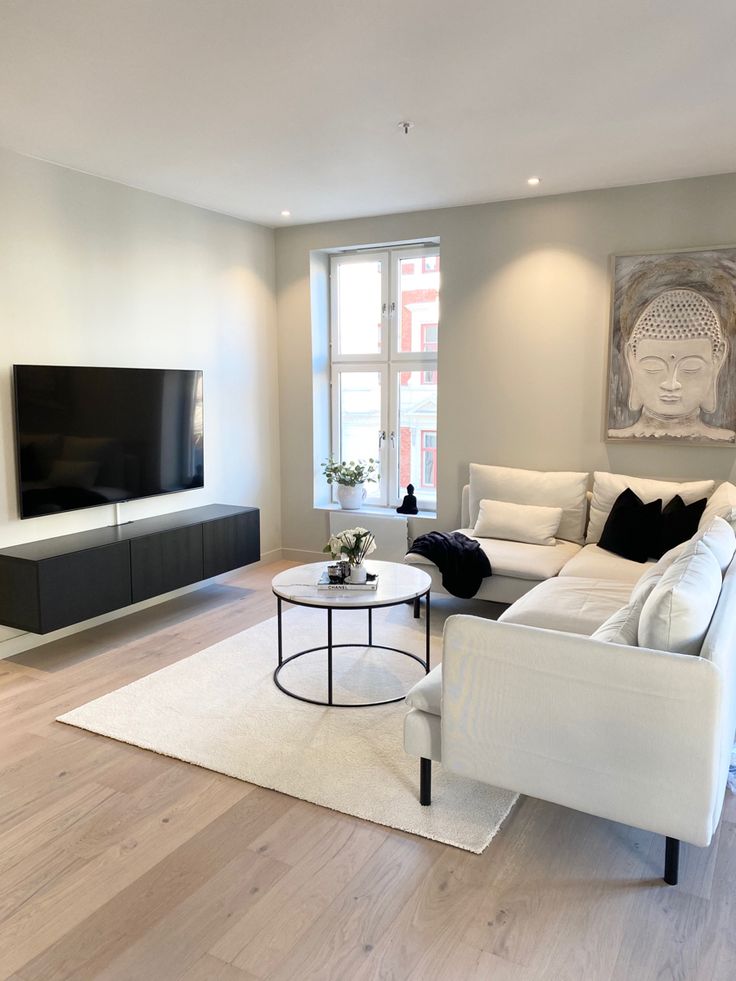 the living room is clean and ready to be used as a home theater or entertainment center