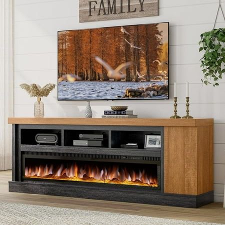 an entertainment center with a fireplace in the middle