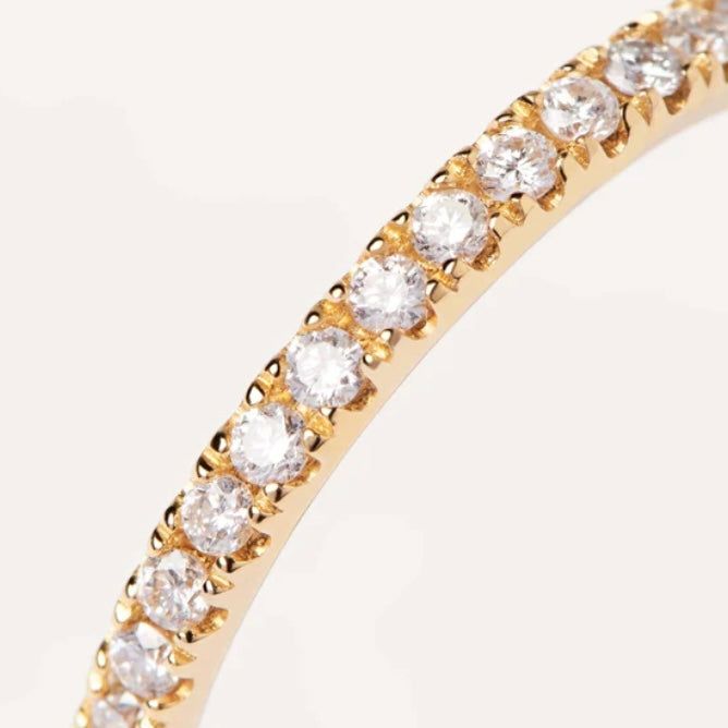 Introducing our exquisite Diamonds and Gold Eternity Medium Ring, tailored for the sophisticated woman who embraces timeless elegance. A mesmerizing array of brilliant diamonds encircle this opulent 18K gold band, captivating every gaze with its unparalleled allure. Graceful, alluring, and captivating - it epitomizes perfection. Embrace eternal beauty, adorned with pure luxury, and let your imagination dance with delight. Sublime sparkle, delicate grace, and a tactile delight - a scintillating m Dazzling Cubic Zirconia Half Eternity Diamond Ring, Dazzling Cubic Zirconia Half Eternity Ring, Everyday Luxury Yellow Gold Diamond Ring, Cubic Zirconia Halo Eternity Band For Anniversary, Anniversary Cubic Zirconia Eternity Band With Halo, Anniversary Eternity Band With Halo Cubic Zirconia, Diamond Eternity Band With Halo For Anniversary, Diamond Halo Eternity Band For Anniversary, Everyday Luxury Yellow Gold Diamond Ring With Accents