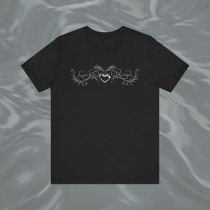 Wings Heart Feminine Tribal Techwear 90s 2000s Babygirl Goth Y2K Hacker Emo Tee Cyber Sigilism Shirt Unisex Jersey Short Sleeve Tee This classic unisex jersey short sleeve tee fits like a well-loved favourite. Show your uniqueness with this individually crafted illustration  ♡ Made with 100% Airlume combed and ring-spun cotton, a lightweight fabric (4.2 oz/yd² (142 g/m that is easy to layer, breathable. Perfect for active and leisure wear. Blends might vary depending on the color and some include Polyester ♡ Bella+Canvas manufactures all its products in the US and internationally in humane, no-sweat-shop, sustainable way and is part of the Fair Labor Association as well as Platinum WRAP certified. ♡ Please note, as each shirt is made to print, placement and color might vary Goth Y2k, Print Placement, 90s 2000s, Leisure Wear, Jersey Shorts, Lightweight Fabric, Bella Canvas, Poland, Tee Shirt