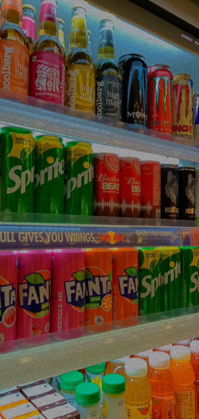 many different flavors of sodas are on display