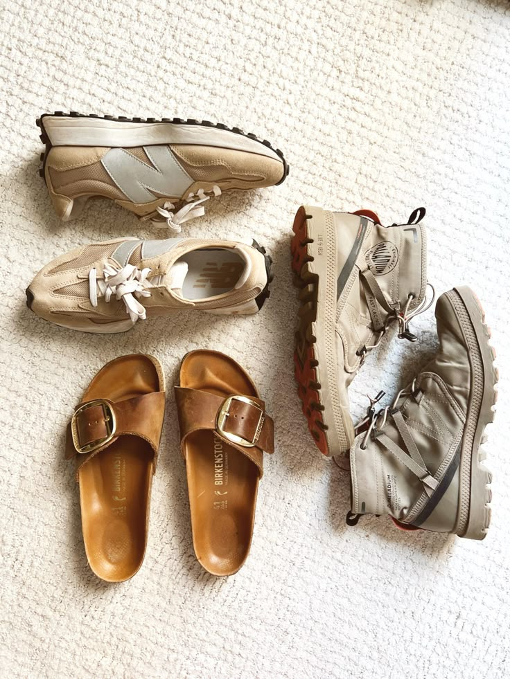 four pairs of shoes are laid out on the floor