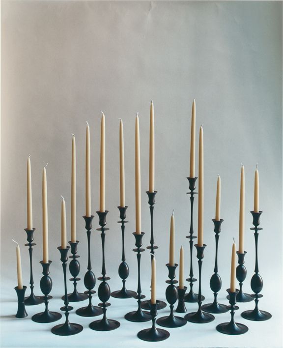 a group of candles sitting next to each other