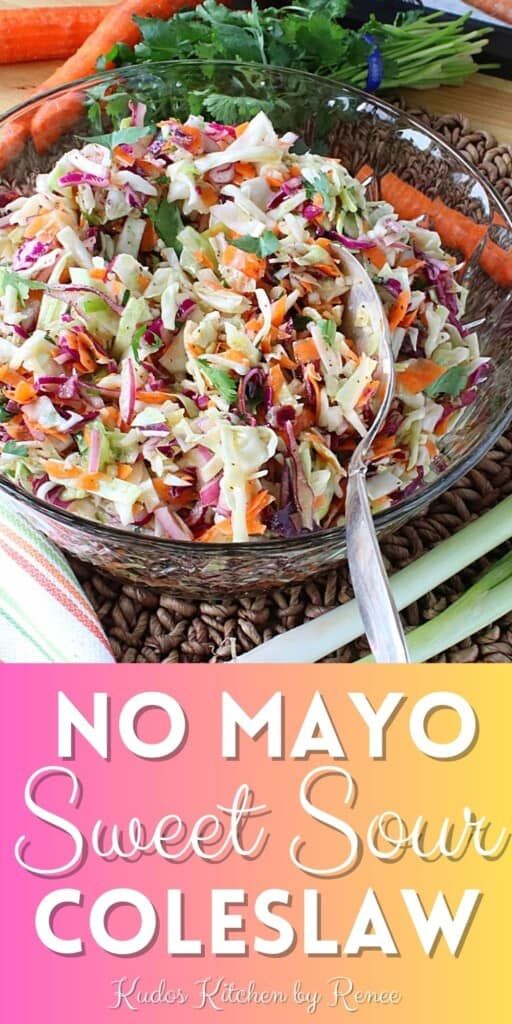 a bowl filled with coleslaw next to carrots and celery on a table