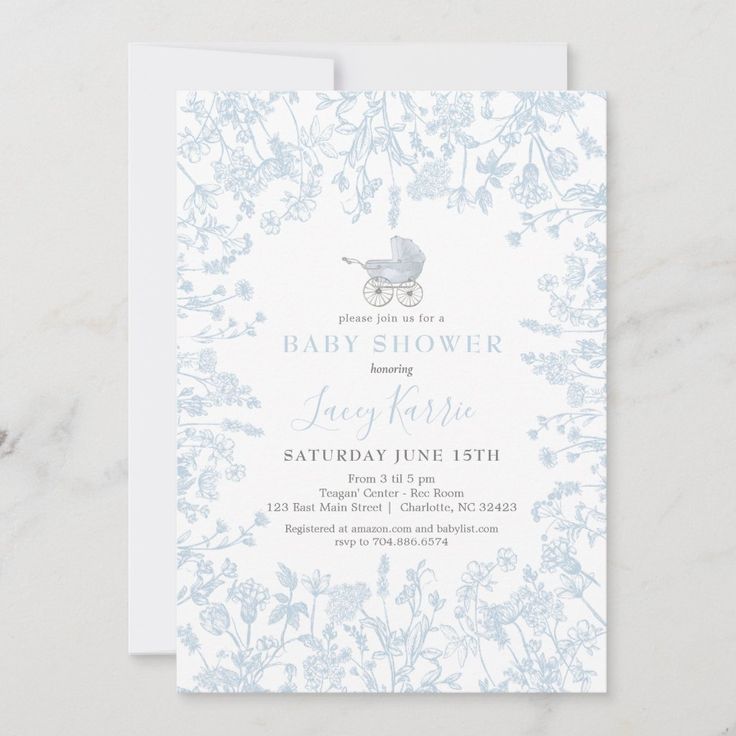 a baby shower is shown with blue flowers and a stroller in the middle, on a white background