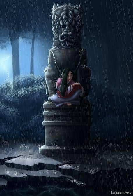 a woman laying on top of a statue under a rain soaked sky in the woods