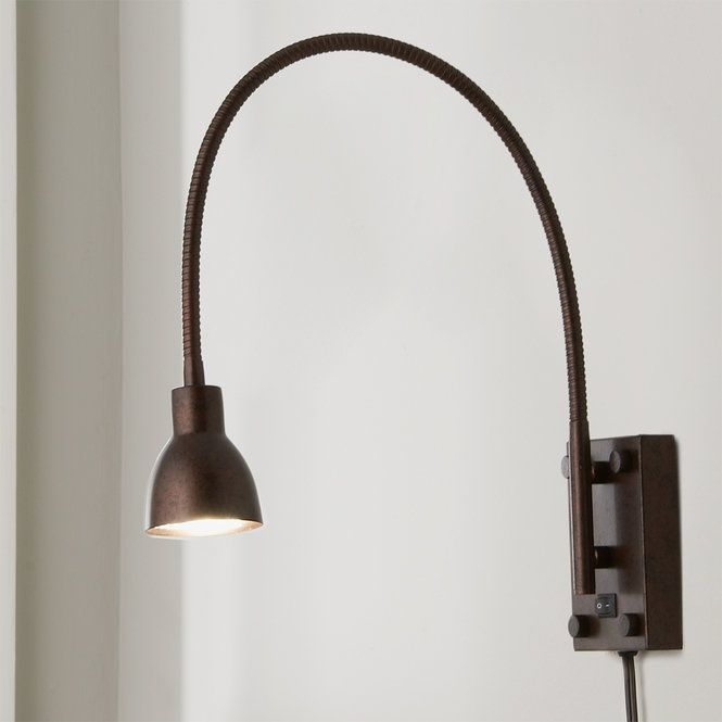 a lamp that is on the side of a wall