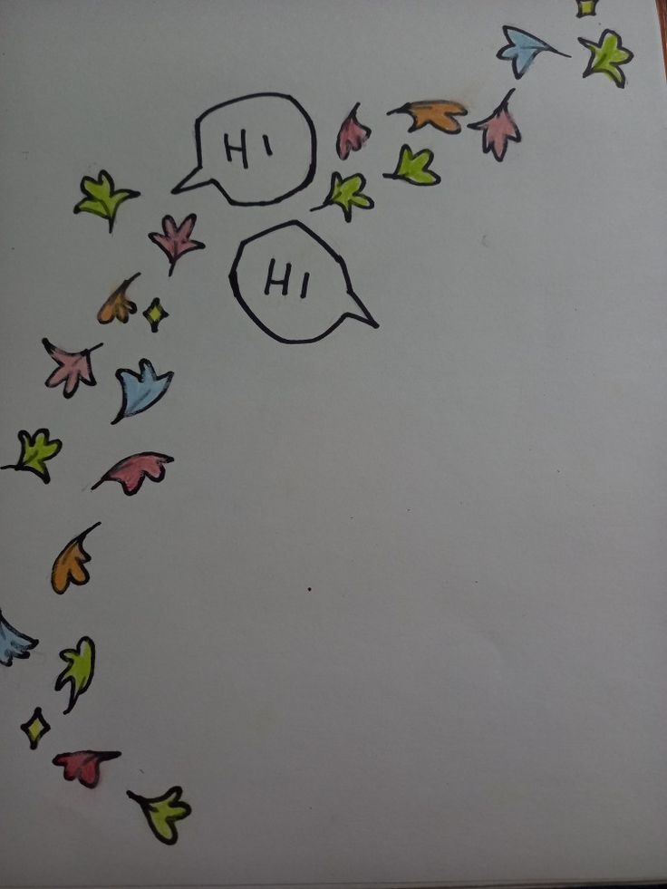 a drawing of leaves and speech bubbles with the word hh above them on a sheet of paper