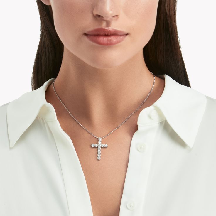 A precious interpretation of a classic motif, our medium cross pendant in white gold is available in a variety of different carat weights, seen here with 0.15 carat diamonds. Deftly suspended from a white gold chain, each diamond is embraced by a minimal metal setting, optimising their brilliance and presence. The Classic Graff collection celebrates the purity and fire of the finest Graff diamonds showcased in truly timeless jewels and eternally elegant silhouettes. A precious interpretation of Elegant Sterling Silver Cross Necklace, Elegant Silver Cross Necklace, Elegant White Cross Necklace Pendant, Elegant White Cross Pendant Necklace, Elegant White Pendant Cross Necklace, Elegant White Crucifix Necklace, White Diamond Cross Pendant Necklace, White Brilliant Cut Cross Pendant Necklace, White Crucifix Cross Necklace With Brilliant Cut