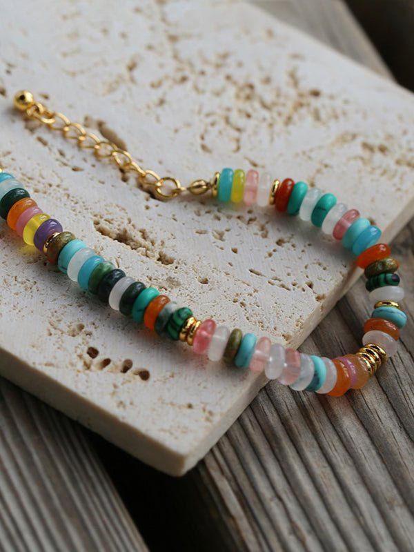 Featuring vibrant natural stone beads in assorted colors, this accessory adds playfulness and vibrancy to any outfit. Each bead is carefully chosen for its unique patterns and hues, making this a lively and exciting piece of jewelry. Perfect for any occasion, this elastic bracelet guarantees a comfortable fit for all-day wear. Metal: 18K Recycled Gold Plated On Brass Gemstone: Multi Stone,White Shell Chain Length:160-190mm Edison Pearls, Natural Stone Beads, Rainbow Beads, Natural Stone Bracelets, Gemstone Beaded Bracelets, Tiger Eye Stone, Elastic Bracelet, Recycled Gold, Multi Stone