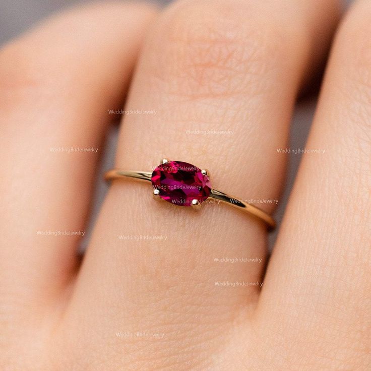 Natural Ruby Gemstone Anniversary Birthstone Gift Ring 14k Solid Yellow Gold Minimalist Vintage Jewelry Gift Ring July Birthstone Gift Ring ≫ Features * SKU : A012 * Gemstone : 100% Natural Ruby Gemstone  * Gemstone Shape : Oval  * Band Size : 1.3 mm * Gemstone Size : 6x4 mm * Birthstone : July  * 14K Solid Yellow Gold, ( Available in 14K & 18K Yellow, Rose, and White Gold ) * Option available in 18K Gold * All size available * Ready to Ship in 1-2 Weeks ≫ FAQ below for more detail. ✦ Sizing We can adjust most items to fit your sizing preferences. Most items can be made to any size and length. Please leave a note at checkout or contact us via Etsy conversation. Even after purchasing the item, you can still ask us to adjust the size or length. We will try our best to fix it if it is possibl Minimalist Oval Birthstone Promise Ring, 14k Gold Gemstone Birthstone Ring, Ruby Stackable Birthstone Rings, Ruby Birthstone Stackable Rings, Minimalist 14k Gold Oval Birthstone Ring, Minimalist 14k Gold Oval Crystal Ring, Minimalist Oval Ruby Wedding Ring, Minimalist 14k Gold Crystal Gemstone Ring, Minimalist Oval Ruby Ring For Anniversary