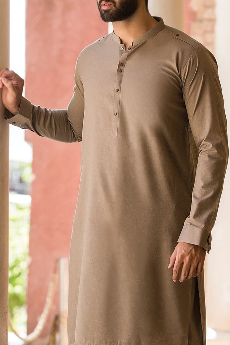 Buy Pakistani men's designer clothes brands from us in USA. This two piece male's dress is of blended fabric. Men's designer clothes brands is in custom size Pakistani Men, Man Dress Design, Clothes Brands, Boys Kurta Design, Wedding Kurta For Men, Kurta Pajama Men, Gents Kurta Design, Gents Kurta, Kurta Men