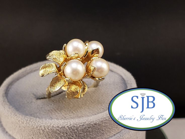 Previously Loved 🥰 Not New ⚪⚪ Vintage Pearl Ring ⚪⚪ Built in all Glowing 14k Yellow Gold ✨️ featuring a fantastic Flower 🌼 Statement Ring Design. Prong set with Four (4) Shimmering Genuine Pearl Gemstones ⚪️⚪️⚪️⚪️ measuring in at approximately 6.5mm each. This AMAZING Vintage Pearl Flower Ring is a Beautiful Statement on its own and a Showstopper with your Stackable  collection a FABULOUS Vintage Treasure 🎁 for any Jewelry occasion.🥰 ️Pearls are an official June Birthstone. ️Weight 10.3 gram Elegant Flower Cluster Ring For Anniversary, Exquisite High Luster Rings For Wedding, Elegant Floral Ring Stamped 14k, 14k Stamped Flower Ring For Anniversary, 14k Stamped Flower Ring For Wedding, High Luster Rings For Anniversary, Heirloom High Luster Rings For Anniversary, Classic 14k Stamped Flower Ring For Anniversary, Formal 14k Stamped Flower Jewelry