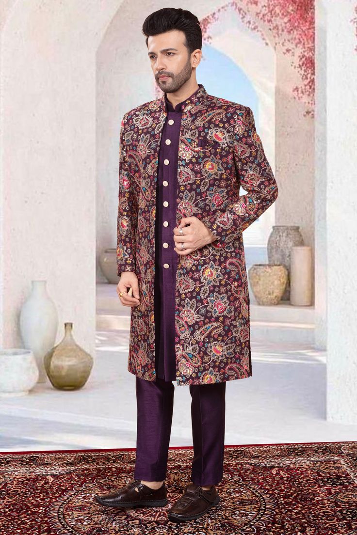 This Mens Sherwani features a multi-color thread embroidery and sequin work, creating a stunning open jacket design. With its traditional yet modern appeal, this sherwani is perfect for weddings and formal occasions. Elevate your style with this expertly crafted piece. Fitted Purple Kurta With Intricate Embroidery, Purple Kurta With Traditional Drape For Transitional Season, Traditional Drape Purple Kurta For Transitional Season, Transitional Purple Kurta With Traditional Drape, Traditional Purple Sherwani For Diwali, Formal Embroidered Purple Traditional Wear, Formal Purple Embroidered Traditional Wear, Purple Long Sleeve Traditional Wear For Transitional Season, Transitional Purple Traditional Wear With Long Sleeves