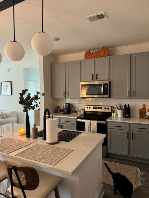 the kitchen is clean and ready to be used as a dining room or living room