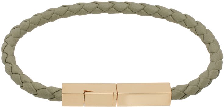 Braided lambskin bracelet in green. Logo-engraved 18k gold-plated sterling silver box-clasp fastening. Full hallmarking. Supplier color: Travertine Luxury Green Rectangular Bracelets, Luxury Rectangular Leather Bracelet, Luxury Engraved Leather Bracelet, Bottega Veneta Green, Gold Knot Bracelet, Green Logo, Knot Bracelet, Braided Leather Bracelet, Braided Bracelet