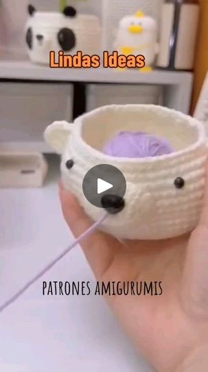 someone is knitting yarn in a cup with the caption, lindas ideas patronnes amigurums