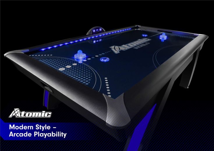 the modern style arcade play table is shown in blue and black colors with lights on it