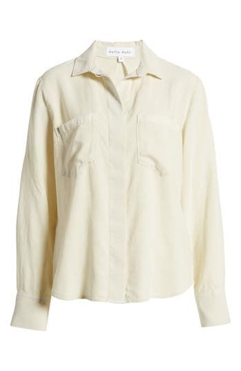 A split back adds soft movement to this slightly oversized button-up shirt cut from a silky, buttery-soft fabric with an eye on sustainability. 25" length Hidden-button placket Spread collar Long sleeves with roll-tab cuffs Chest patch pockets 100% Tencel® lyocell Tencel lyocell is a sustainably produced fiber made with closed-loop processing Machine wash, tumble dry Imported Women's Clothing Chic Long Sleeve Rayon Shirt, Unstructured Long Sleeve Tops For Daywear, Versatile Button-up Shirt For Daywear, Chic Button-up Rayon Shirt, Fall Rayon Button-up Shirt, Fall Button-up Rayon Shirt, Classic Rayon Spring Shirt, Daywear Button-up Rayon Shirt, Cream Long Sleeve Everyday Shirt