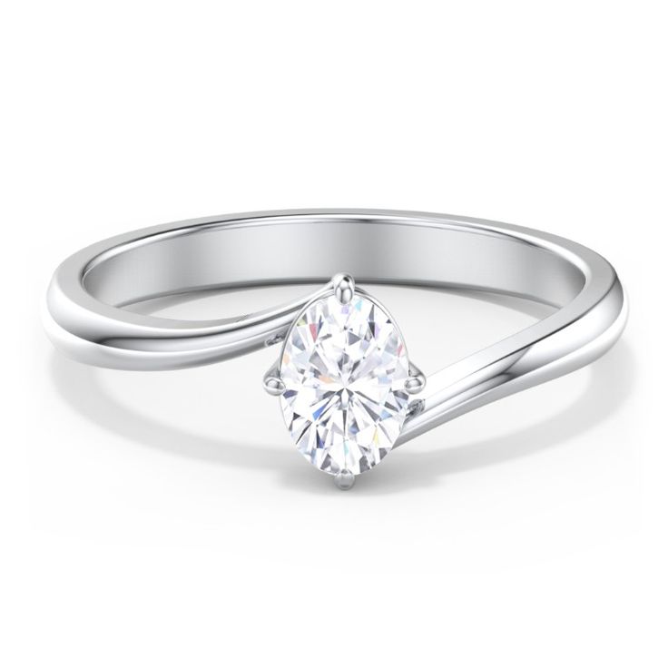 a white gold engagement ring with a round cut diamond