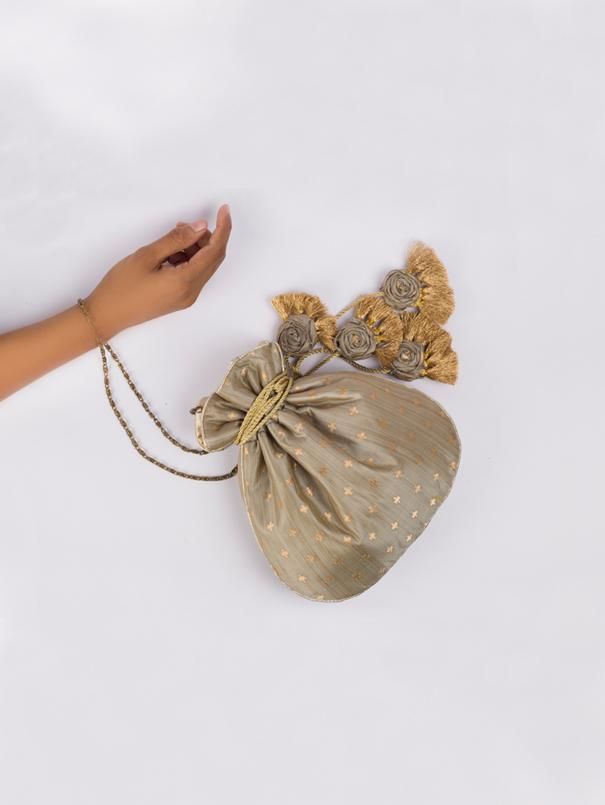 Deep Grey Chandani Potli Bag By Vareli Bafna now available at Trendroots Flower Tassels, Potli Bag, Mild Cleanser, Potli Bags, Fancy Bags, Deep Gray, Gold Fabric, Handmade Flower, Grey Color