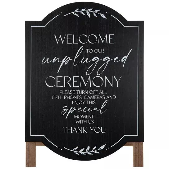 a black and white sign that says welcome to our unplugged ceremony