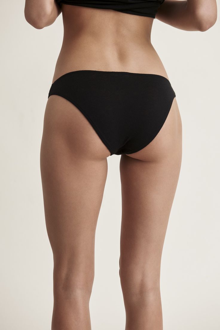 Seamless Cotton Beach Bottoms, Fitted Cotton Bottoms With Elastic Band, Cotton Bottoms With Seamless Construction For Loungewear, Cotton Seamless Loungewear Bottoms, Stretch Cotton Swim Briefs, Stretch Cotton Beachwear Bottoms, Stretch Cotton Bottoms For Beachwear, Seamless Brief Bottoms For Everyday, Everyday Seamless Brief Bottoms