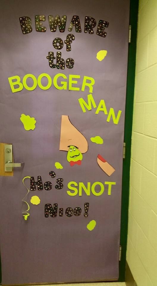 a door decorated with the words booger man and his snot nice on it