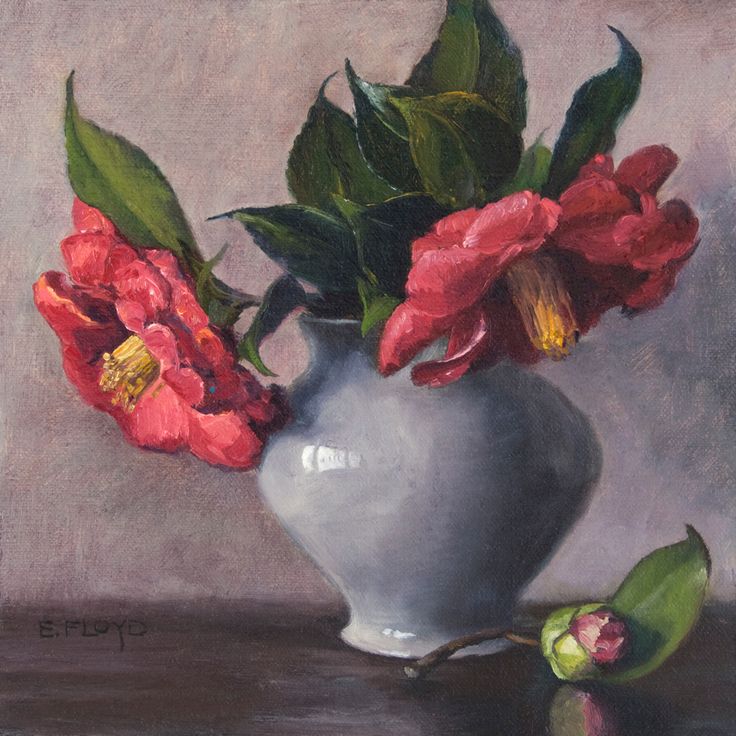 a painting of red flowers in a white vase with green leaves on a table top