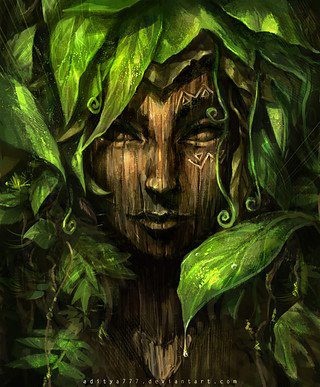 a painting of a woman with green leaves on her head and face, surrounded by foliage