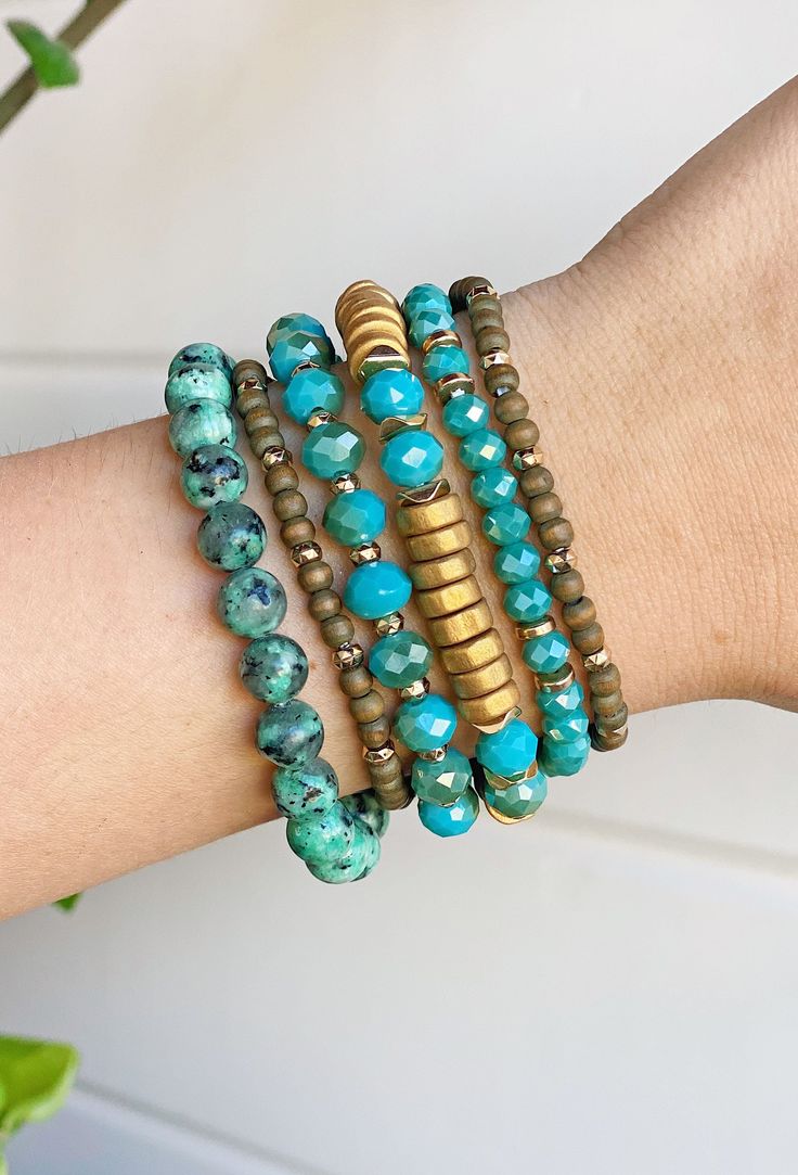 Zoey Bracelet Set in Turquoise, set of 6, turquoise colored beads mixed with gold Everyday Turquoise Stackable Stretch Bracelet, Trendy Turquoise Jewelry For Everyday Wear, Trendy Turquoise Jewelry For Everyday, Everyday Bohemian Turquoise Stretch Bracelet, Adjustable Turquoise Stretch Bracelet, Trendy Turquoise Stretch Bracelet For Everyday, Adjustable Stackable Turquoise Wrap Bracelet, Turquoise Stackable Adjustable Beaded Bracelets, Trendy Turquoise Stackable Beaded Bracelets